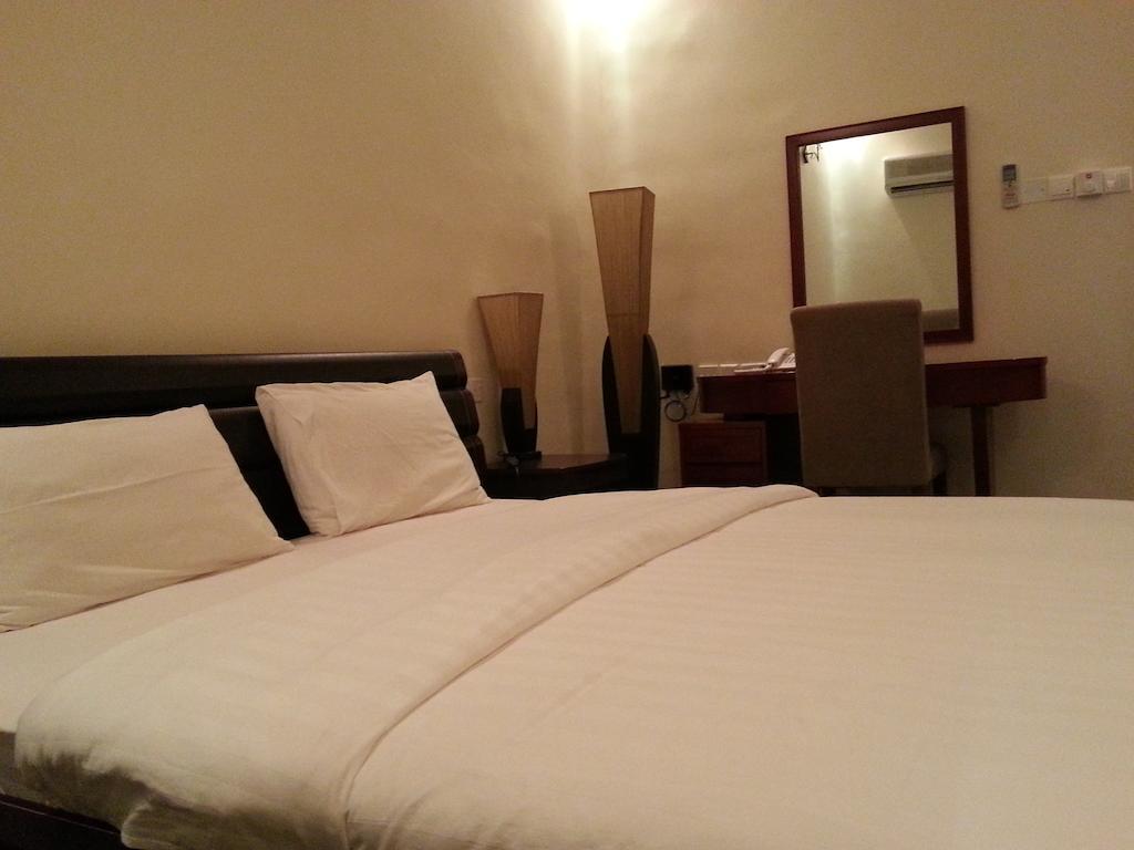 Rimal Suites Apartments Szalála Szoba fotó