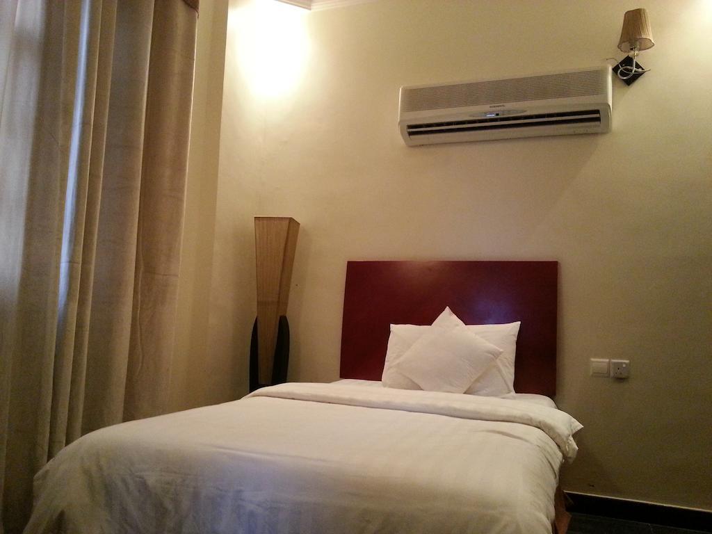 Rimal Suites Apartments Szalála Szoba fotó
